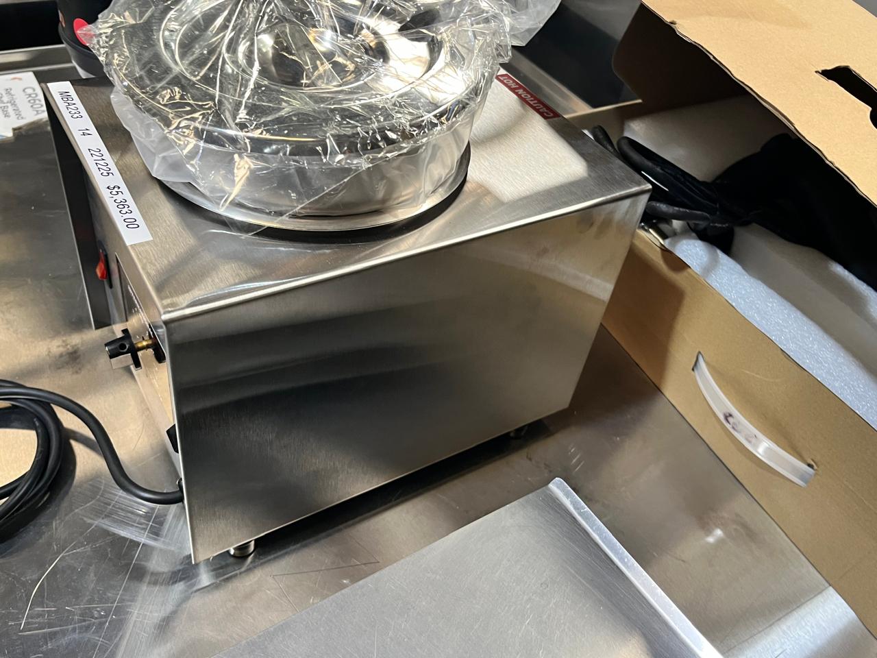 International Calentador Multifuncional Chocolate CMF-1 Seminuevo